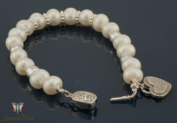 Bransoletka z białych pereł naturalnych w srebrnej oprawie